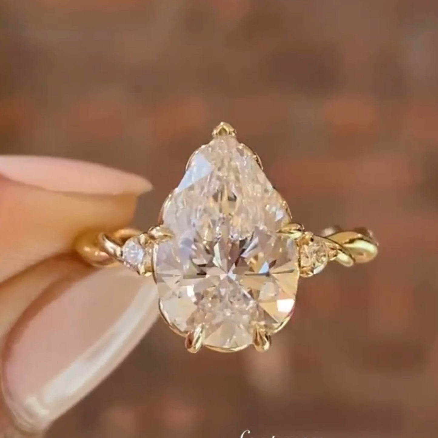 pear cut moissanite diamond ring three stone tulip set twisted band ring