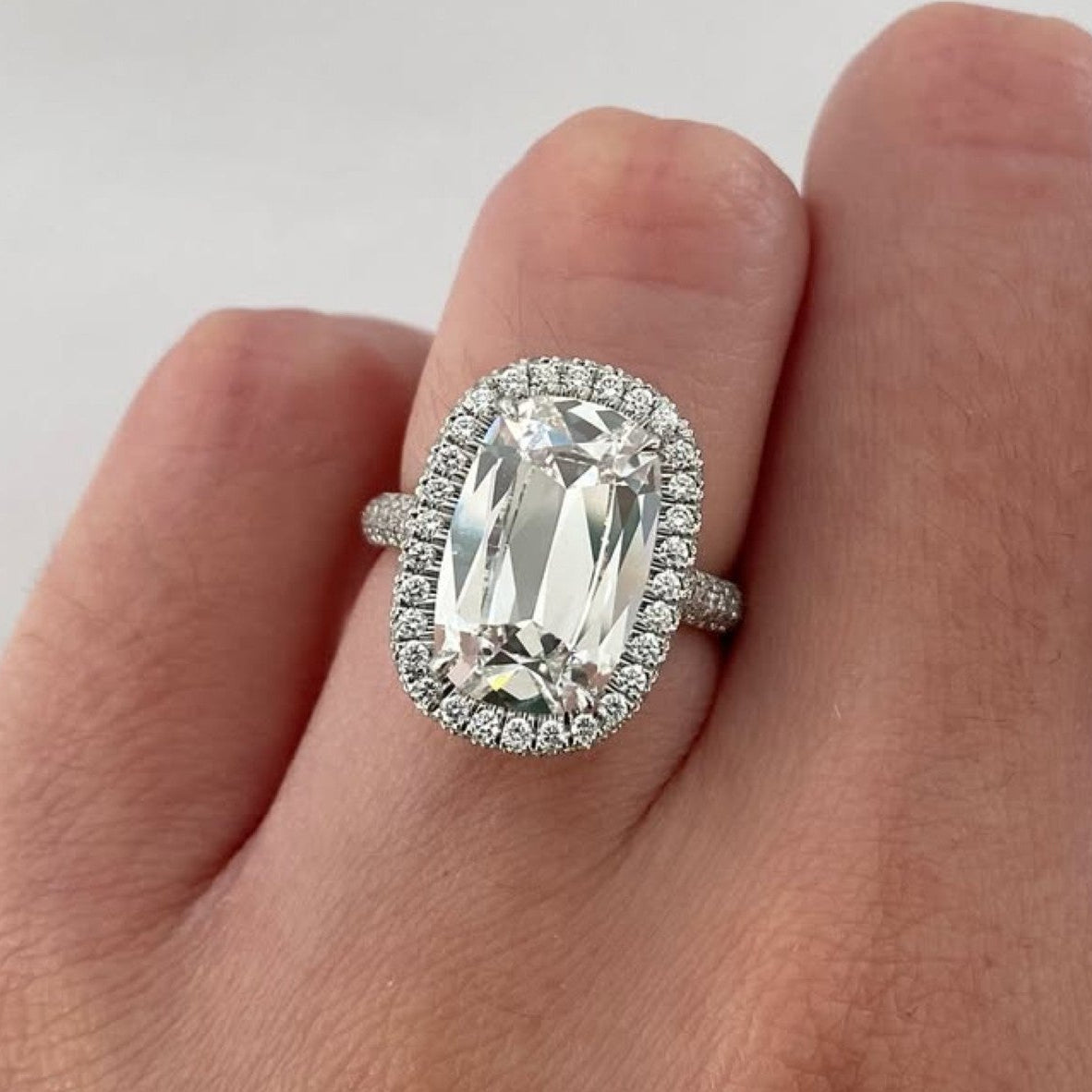 old mine elongated cushion lab grown engagement ring halo set wedding ring