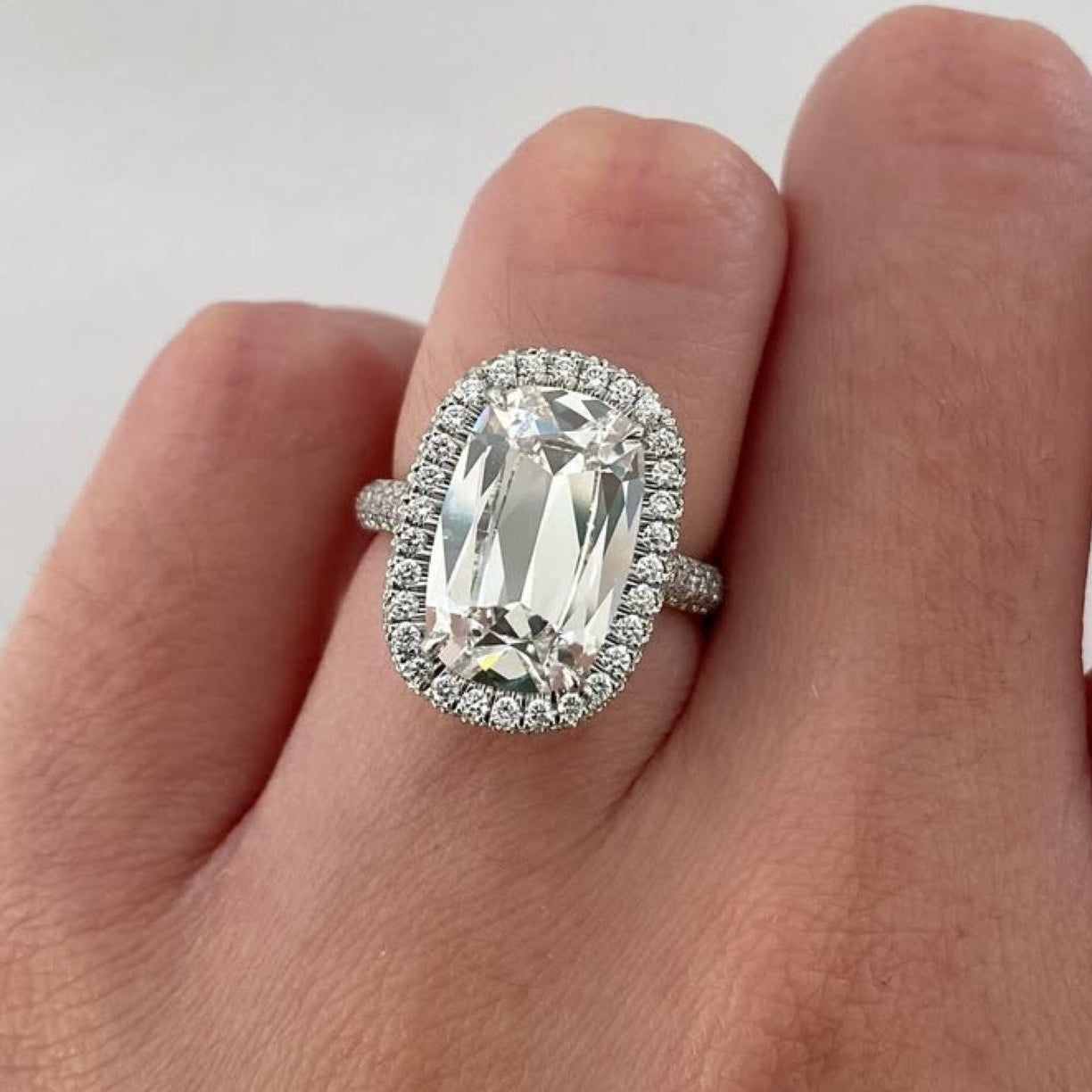 old mine elongated cushion moissanite engagement ring halo set wedding ring