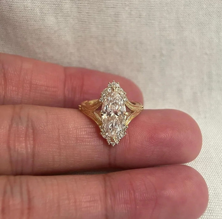 Marquise ring in a vintage engraved yellow gold setting