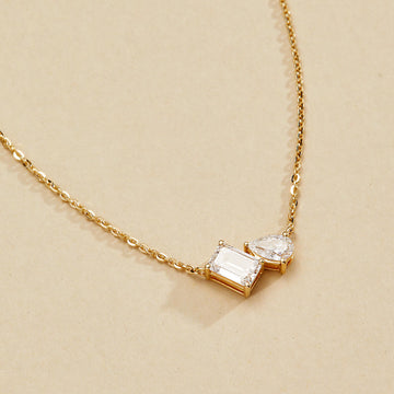 1.25 TCW Emerald and Pear Toi Et Moi Gold Necklace by Claire Diamonds