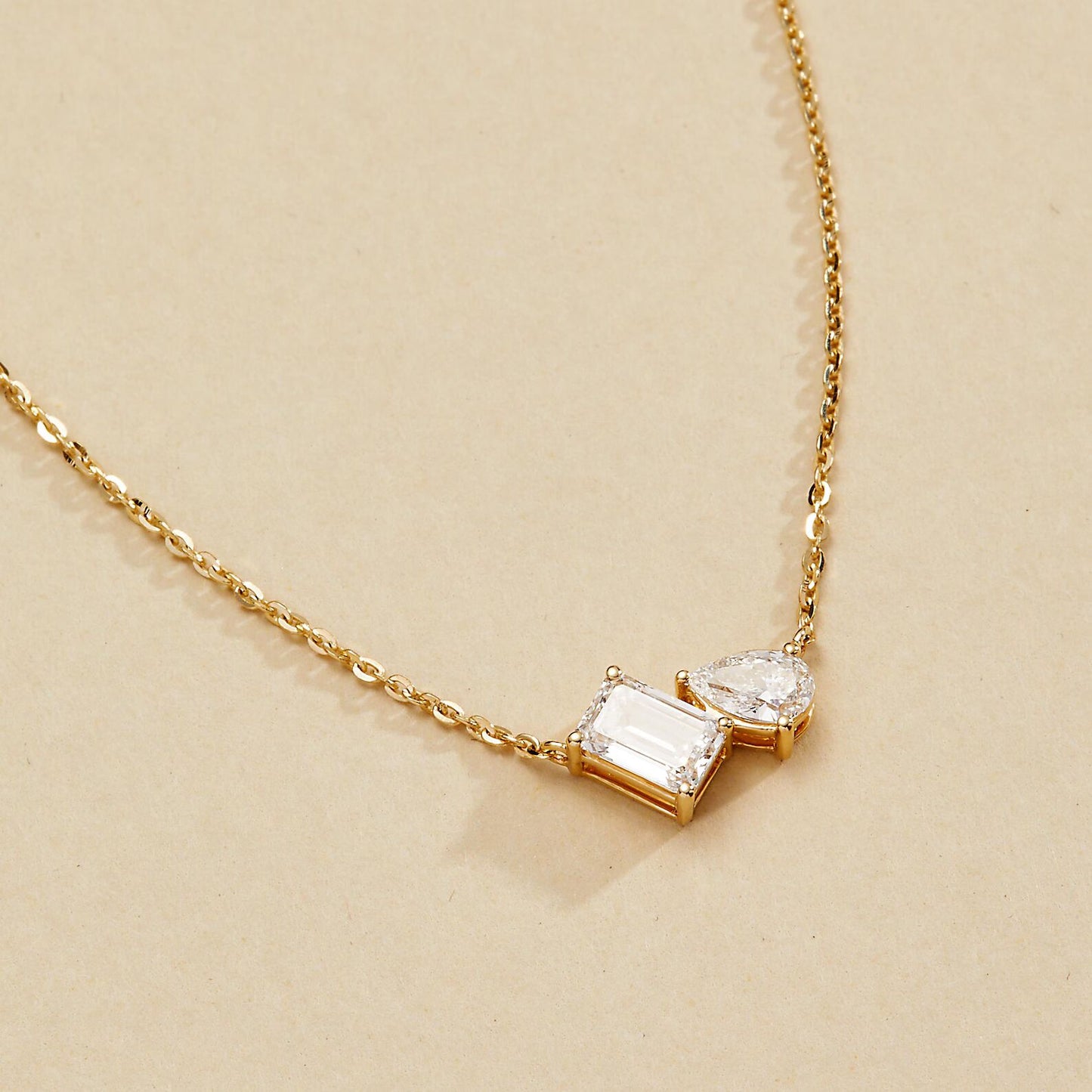 1.25 tcw emerald and pear toi et moi gold necklace, two stone lab diamond pendant