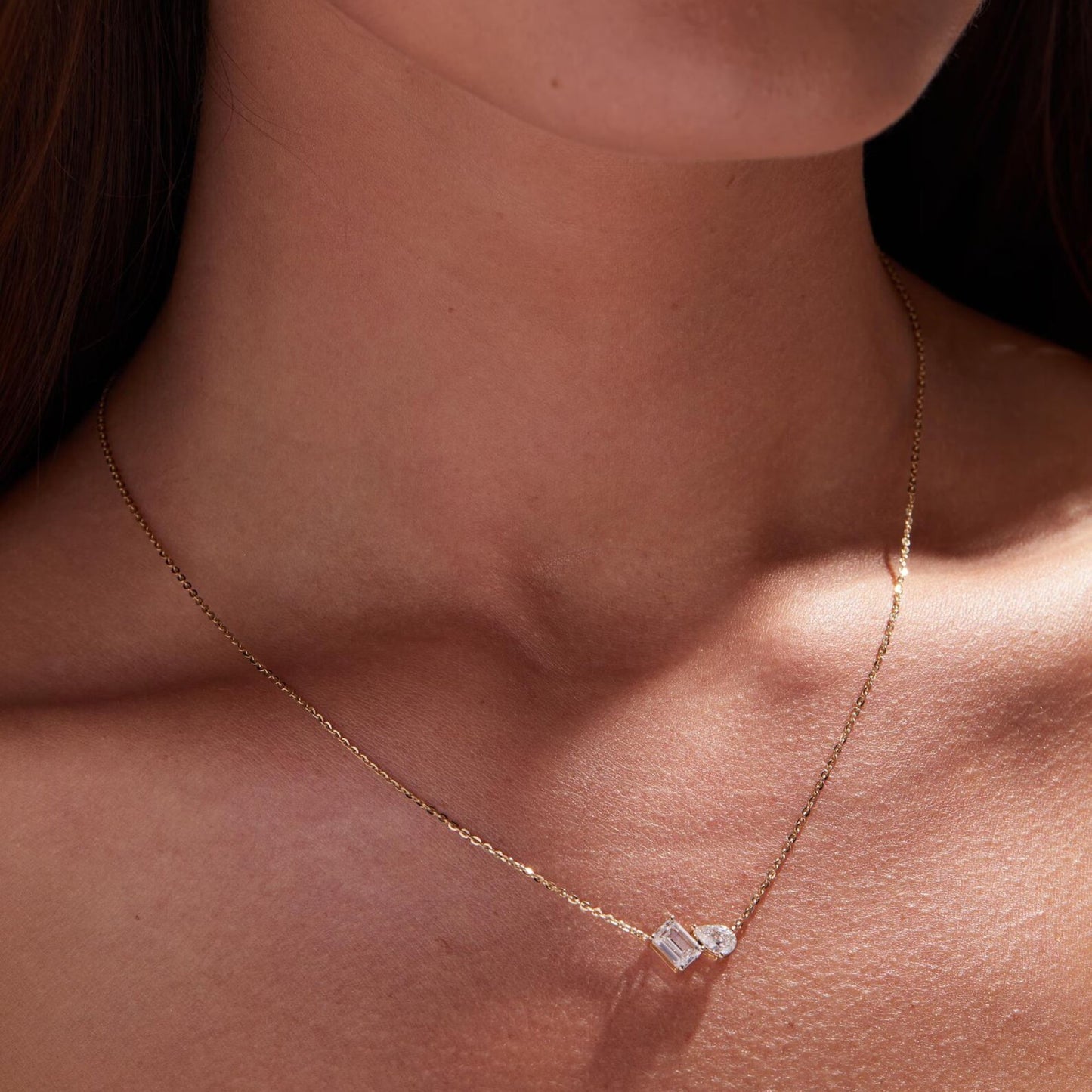 1.25 tcw emerald and pear toi et moi gold necklace, two stone lab diamond pendant