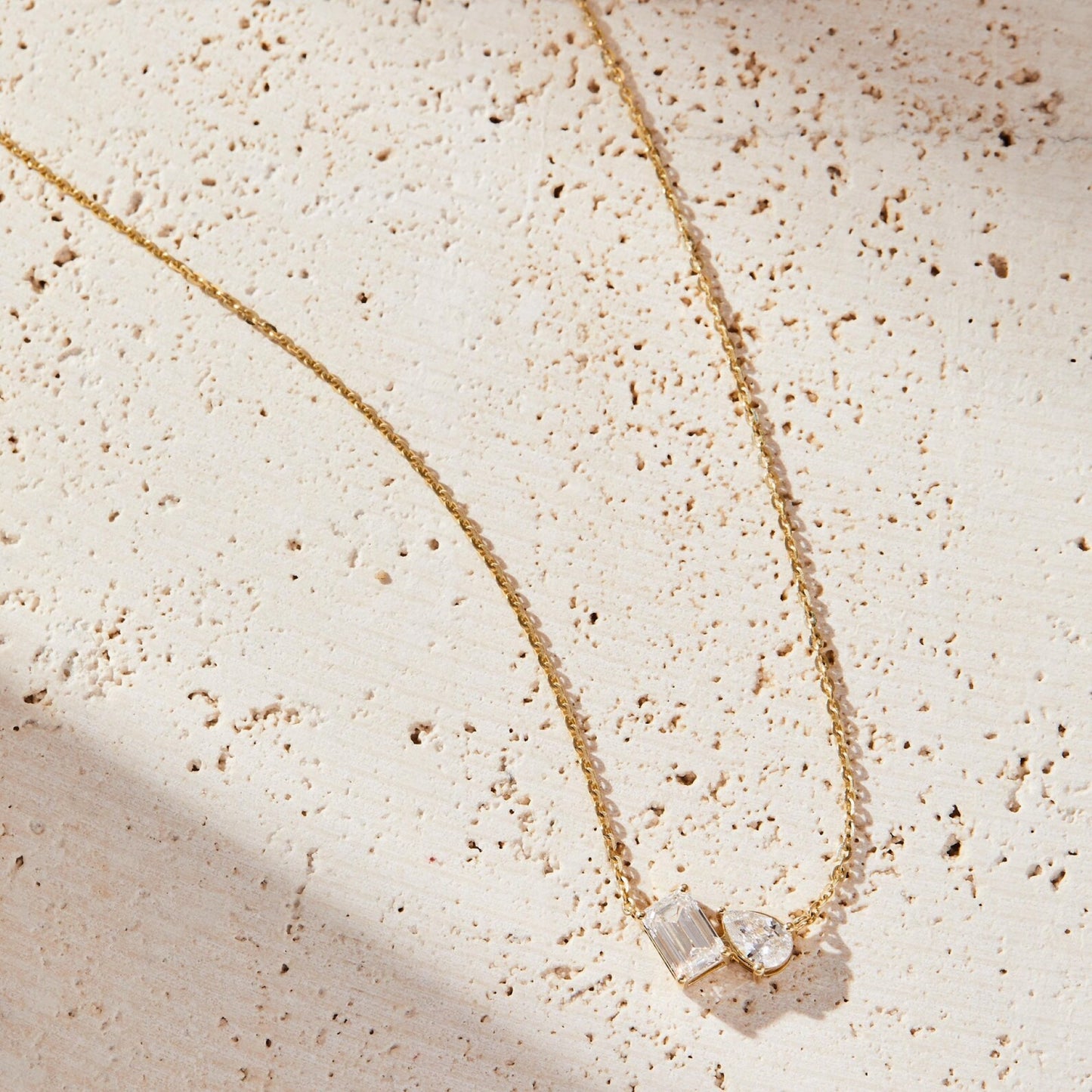 1.25 tcw emerald and pear toi et moi gold necklace, two stone lab diamond pendant