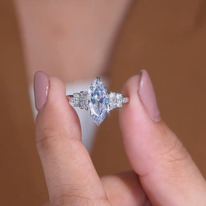 Timeless Marquise Lab Grown Diamond Ring with Delicate Sparkling Side Stone Detailing and Elegant Engagement Ring