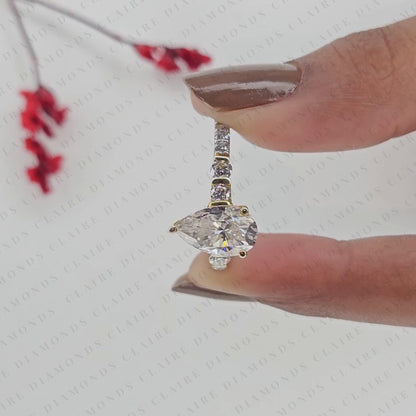 Pear Cut Moissanite Diamond Engagement Ring in Two Tone Gold Shoulder Ring with Round Diamond Accents