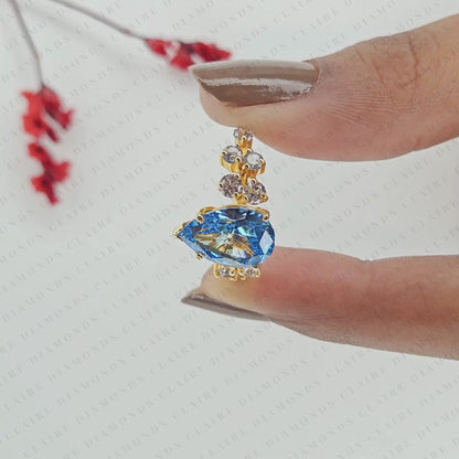 Pear Cut Blue Lab Grown Engagement Ring, Round Diamond Floral Side Stones, Yellow Gold Nature-Inspired Bridal Ring