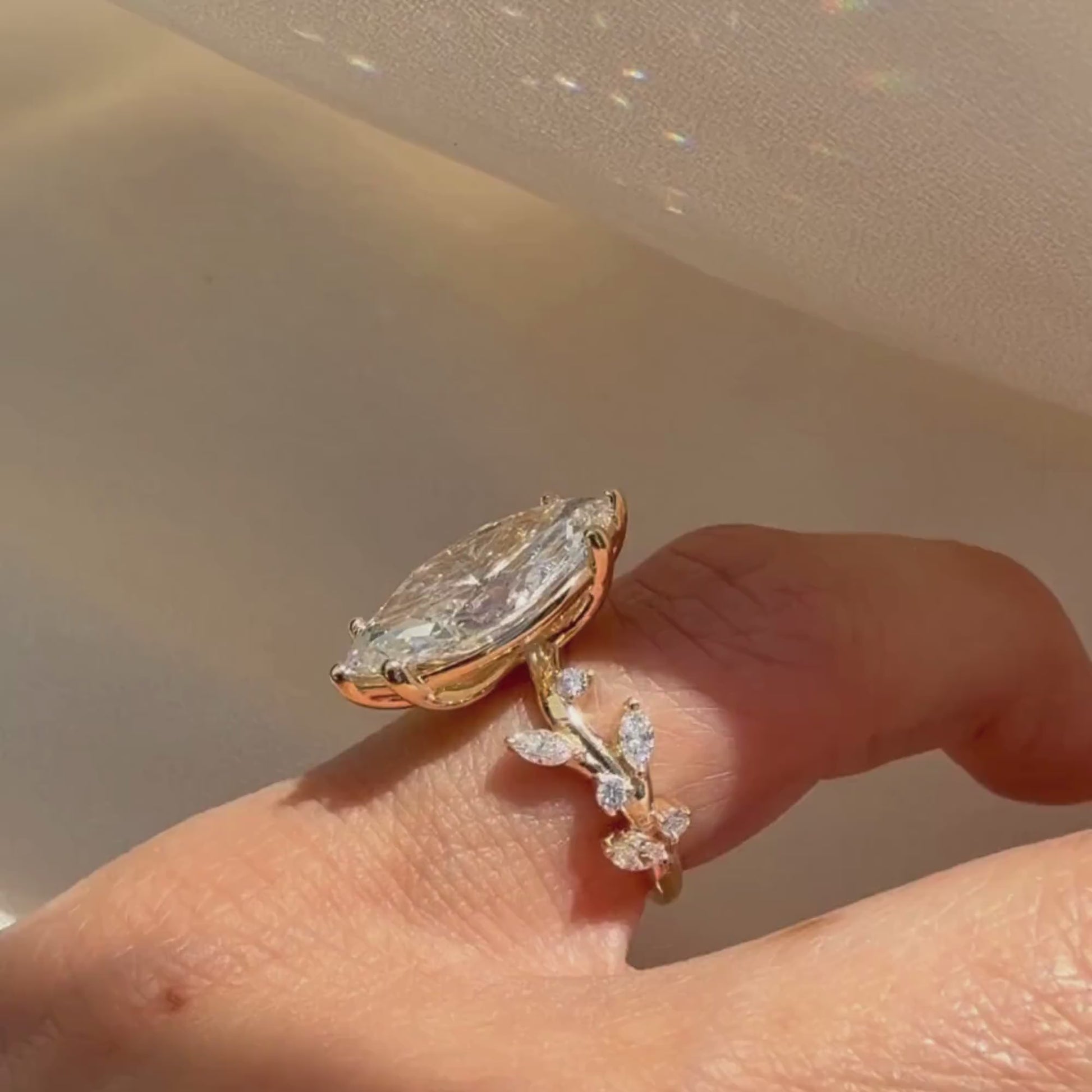 golden_diamond_ring_in finger