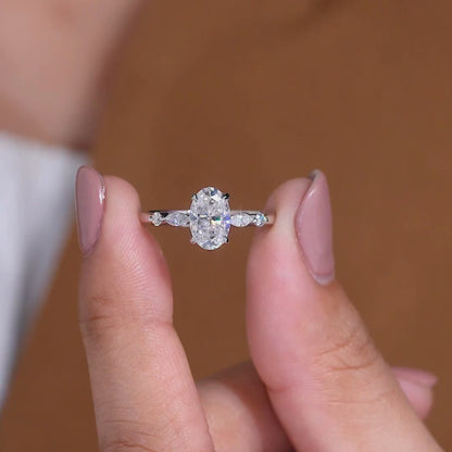 Elegant Oval Cut Lab Grown Diamond Engagement Ring with Marquise Side Stones in White Gold